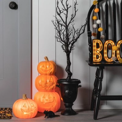 Hyde & EEK! Boutique 8" Light Up Pumpkin with 2 Teeth Halloween Decorative Prop - Hyde & EEK! Boutique™ 1 Hyde & EEK! Boutique 8" Light Up Pumpkin with 2 Teeth Halloween Decorative Prop - Hyde & EEK! Boutique™