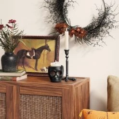 Small Ceramic Stoneware Skull Candle Holder with Reactive Glaze Black - Threshold™