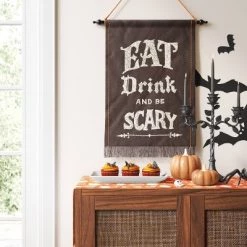 16" x 22" 'Eat Drink and Be Scary' Embodied Cotton Slub Wall Hanging Black - Threshold™