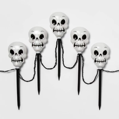 Hyde & EEK! Boutique 5ct Incandescent Clear Skull Halloween Pathway Stake Lights - Hyde & EEK! Boutique™ 2 Hyde & EEK! Boutique 5ct Incandescent Clear Skull Halloween Pathway Stake Lights - Hyde & EEK! Boutique™ - Image 2
